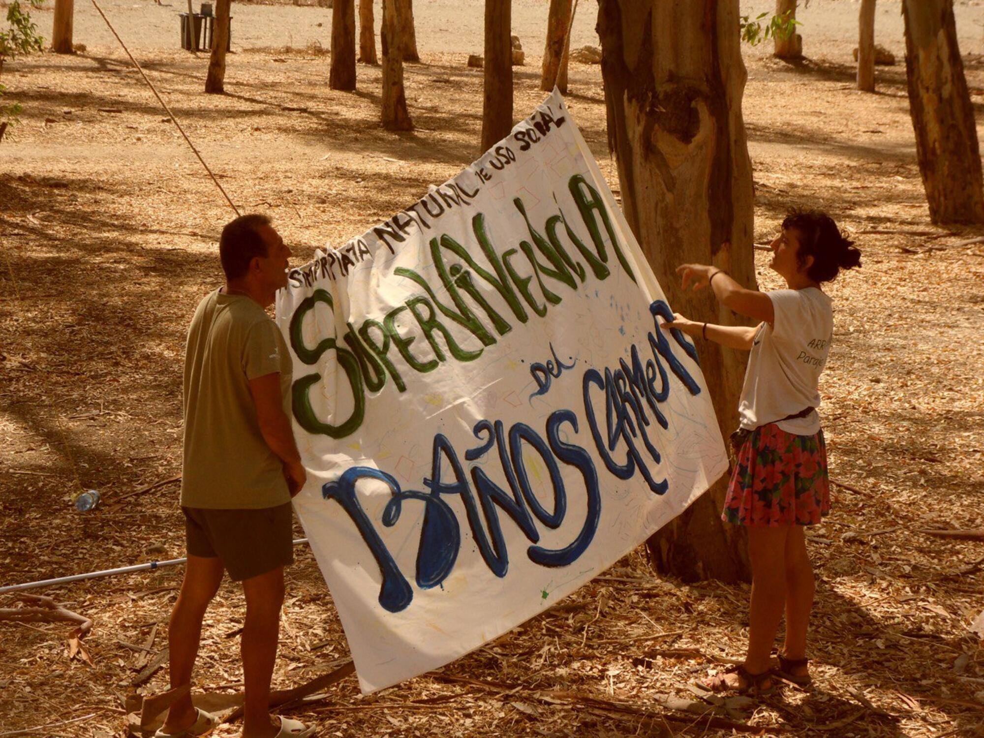 Baños del Carmen pancarta